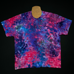 An example of another, different cloud 9 marbled ice tie-dyed t-shirt design; laid flat on a solid black background before shipping