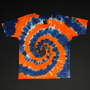 Toddler size orange & dark blue Detroit Tigers colored spiral tie dye t-shirt; laid flat on a solid black background.