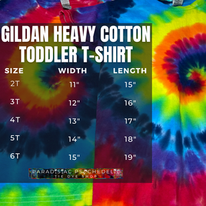 Gildan Heavy Cotton Toddler Short Sleeve T-Shirt size chart graphic with width by length measurements (in inches) for toddler sizes 2T-6T; with two ROYGBIV rainbow spiral tie dye tees in the background