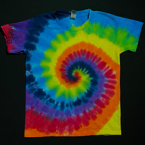 Front side of a youth short sleeve tie dye t-shirt featuring a ROYGBIV Rainbow design, including shades of: red, orange, yellow, green, blue, indigo & violet, in a classic spiral pattern