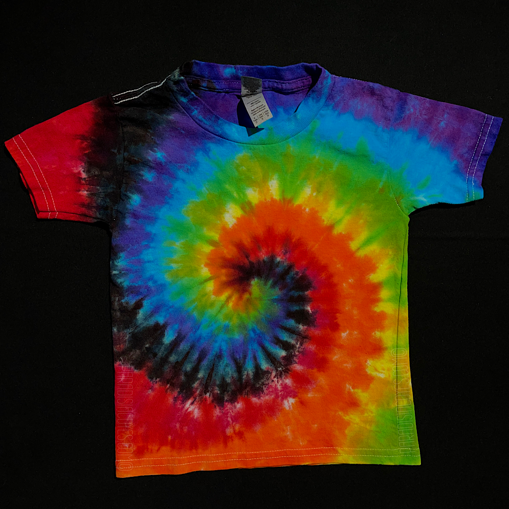 Front side of a toddler short sleeve t-shirt featuring a classic rainbow color scheme, including: red, orange, yellow, green, blue & purple, with black