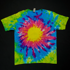 A different, finished, one-of-a-kind Neon Rainbow Sunburst tie dye design, on a short sleeve youth t-shirt