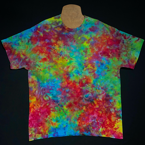 Marbled splatter pattern ice tie-dyed short sleeve shirt featuring a superman ice cream inspired color combination