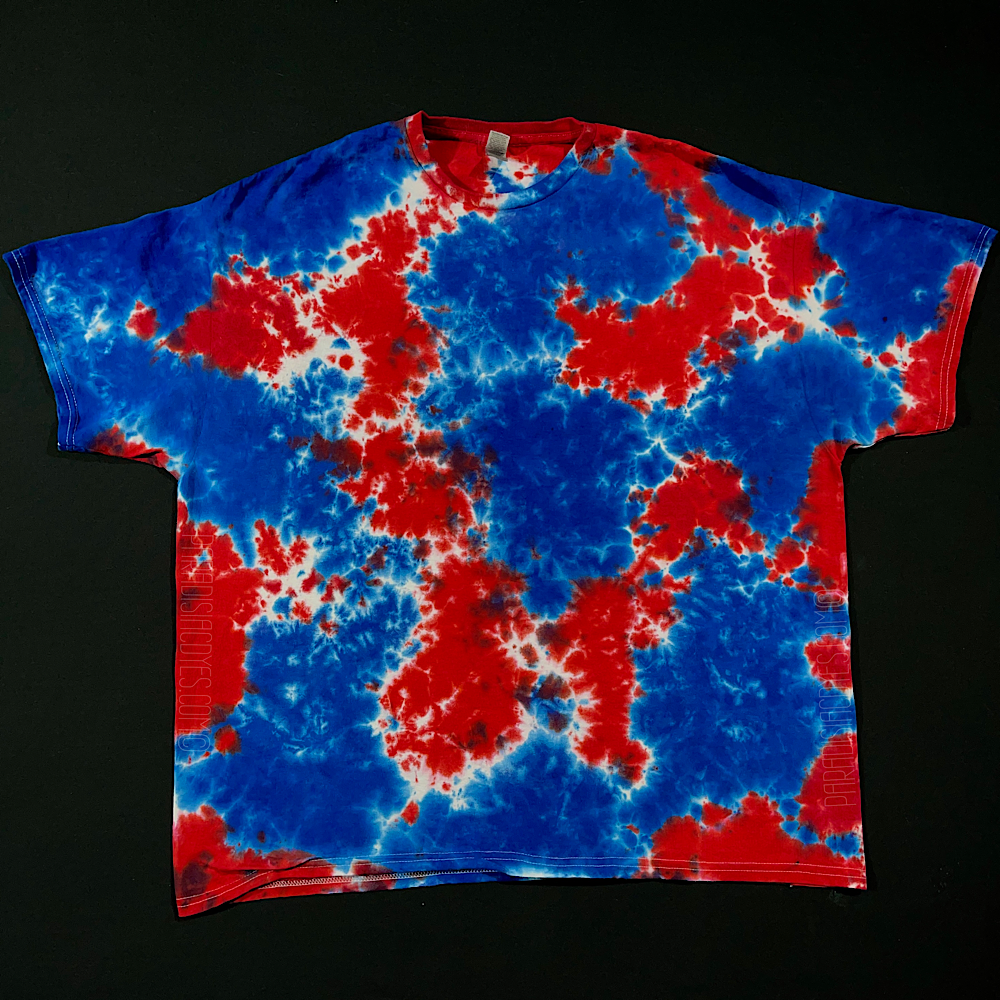Another example of a finished, hand-dyed, one-of-a-kind red, white & blue splatter pattern short sleeve tie dye t-shirt