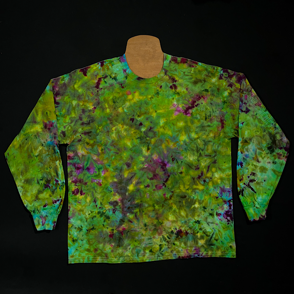 Front side of a marijuana bud inspired tie dye splatter design featuring green and purple shades, in a speckled pattern reminiscent of a weed nug 