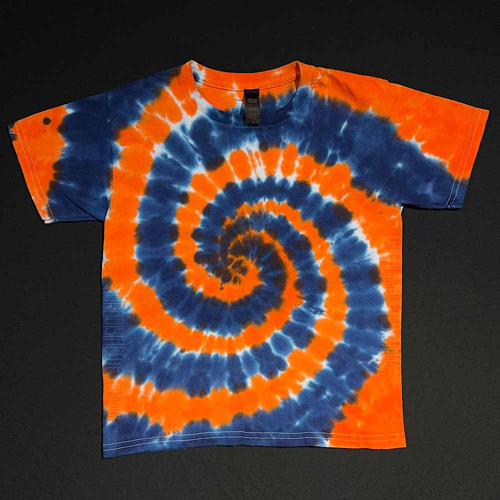 Children's Detroit Tigers spiral tie-dye t-shirt; laid flat on a solid black background.