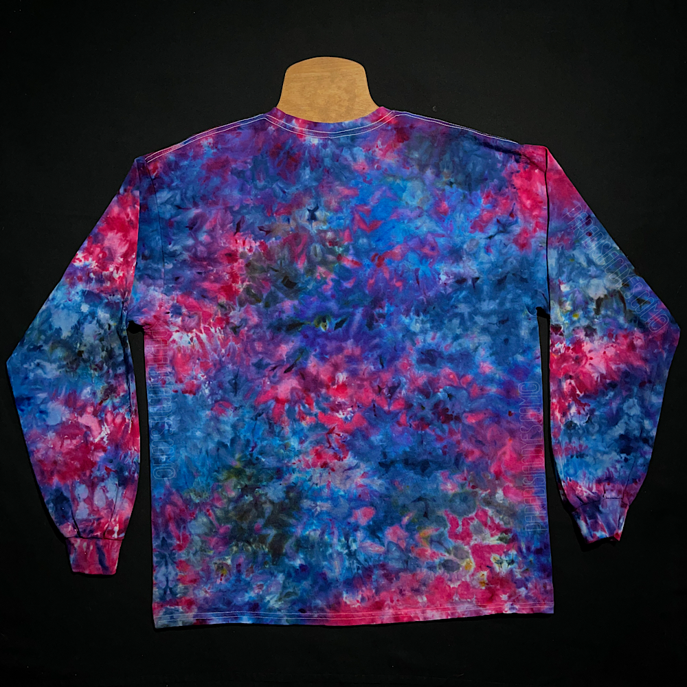 Back side of the same Cloud 9 blue, pink & purple marbled splatter ice tie-dyed long sleeve shirt design; laid flat on a solid black background 