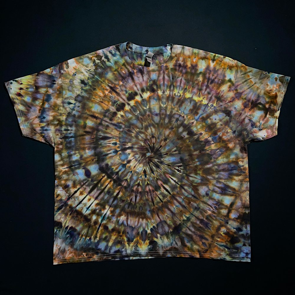 An example of an actual, finished Earthy Neutral Ice Dyed Spiral T-Shirt design before shipping; to depict how much each handmade-to-order design may vary