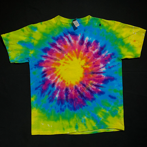 An example of another different Neon Rainbow Sunburst toddler size short sleeve tie dye t-shirt; featuring a yellow center with peach, pink, magenta, blue & lime green radiating outward