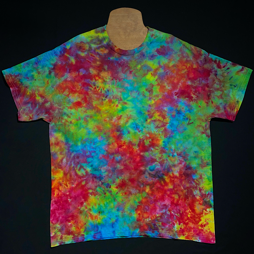 Marbled splatter pattern ice tie-dyed short sleeve shirt featuring a superman ice cream inspired color combination 