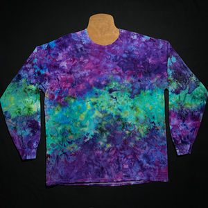 Front side of a Purple & Mint Green Marbled Ice Dye Long Sleeve Shirt design; laid flat on a solid black background 