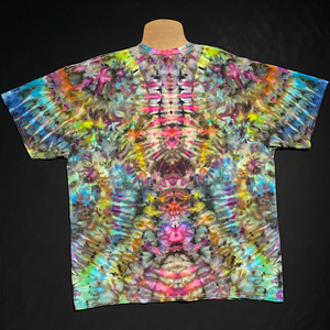 Back side of an abstract, symmetrical ice tie-dyed design featuring vibrant rainbow colors and a totem pole reminiscent pattern.