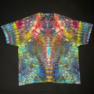 Front side of an abstract, symmetrical Psychedelic Mindscape ice tie-dyed design featuring rainbow colors painted across a totem pole reminiscent pattern.