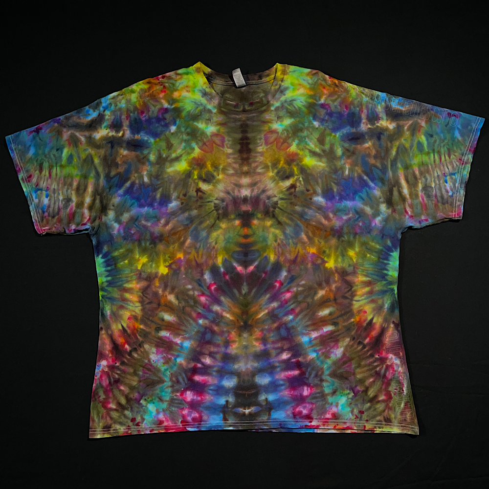 Front side of a size XXXL dark, muted rainbow abstract, symmetrical ice tie-dyed t-shirt design; laid flat on a solid black background