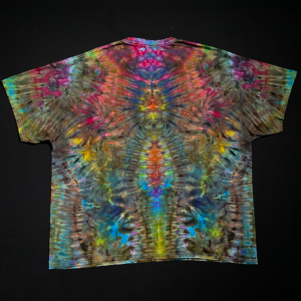 Back side of the same size 3XL abstract, symmetrical tropical rainbow Psychedelic Mindscape ice tie-dyed t-shirt design; laid flat on a solid black background 