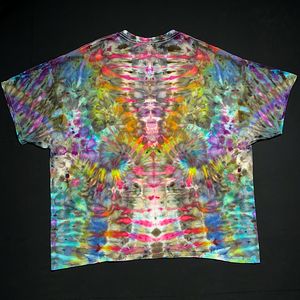 Back side of the same abstract, symmetrical Psychedelic Mindscape ice tie-dyed design featuring rainbow colors in a totem pole reminiscent pattern; laid flat on a solid black background.