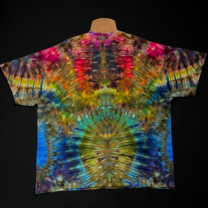 Back side of the same abstract, symmetrical, totem poke reminiscent, rainbow gradient ice dyed t-shirt design; laid flat on a solid black background