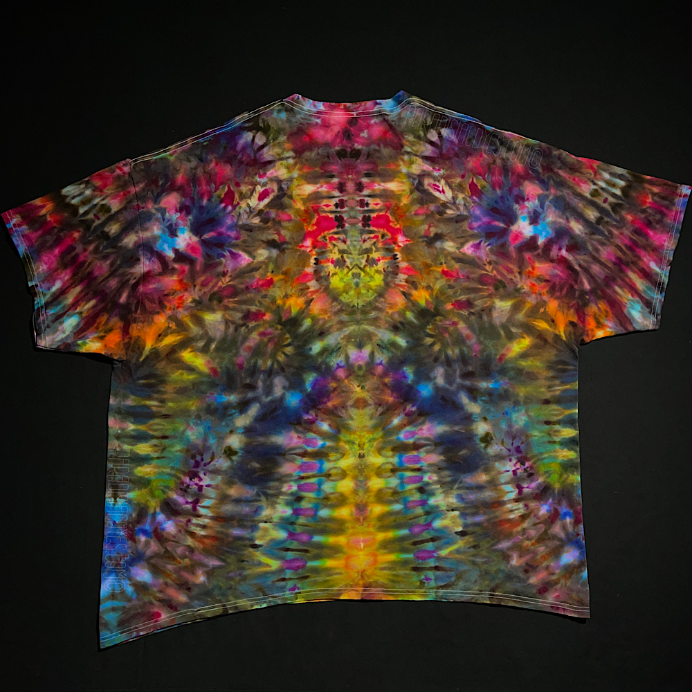 Front side of a size 4XL abstract, symmetrical Psychedelic Mindscape ice tie-dyed short sleeve shirt; featuring intensely vibrant rainbow colors in a totem pole reminiscent pattern