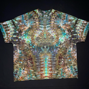 Front and back side of an abstract, symmetrical ice tie-dyed design featuring an earthy, beachy color scheme and a totem pole reminiscent pattern.