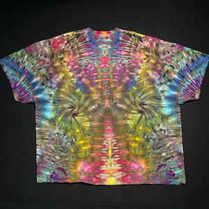 Back side of a hand-dyed, one-of-a-kind, abstract, symmetrical Psychedelic Mindscape ice tie-dyed design featuring a captivating rainbow color scheme, with totem pole reminiscent detailing, laid flat on a solid black background.