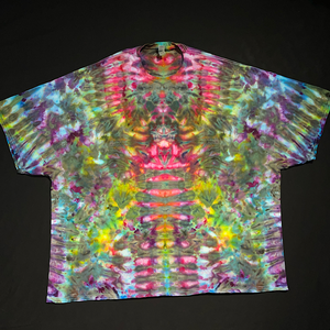 Front side of an abstract, symmetrical Psychedelic Mindscape ice tie-dyed design featuring vibrant rainbow colors in a totem pole reminiscent pattern.