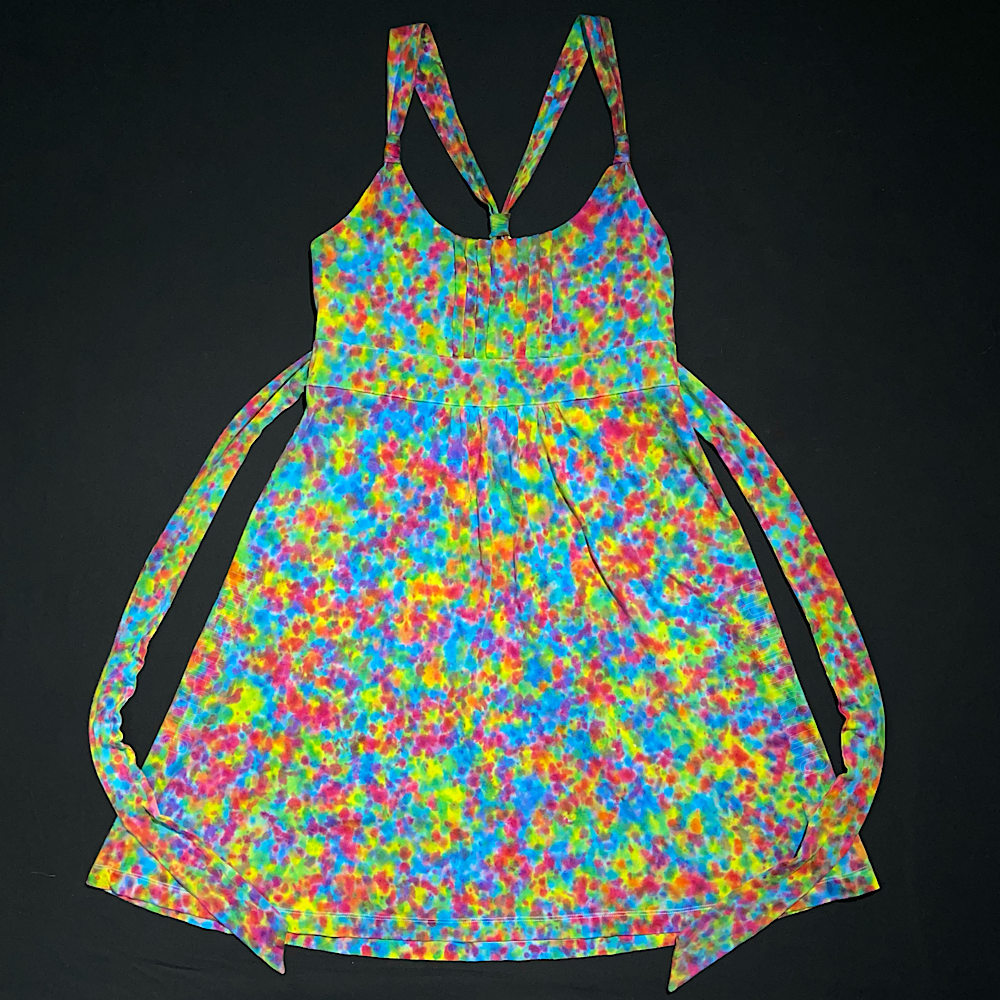 Front side of an American Eagle halter dress hand-dyed in a vibrant pink Rainbow speckled splatter tie dye pattern 