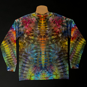 Back side of the same muted rainbow symmetrical pattern long sleeve ice tie-dyed shirt; laid flat on a solid black background
