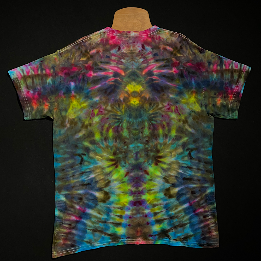 Back side of the same adult large vibrant, tropical rainbow Psychedelic Mindscape ice tie-dyed t-shirt design; laid flat on a solid black background 