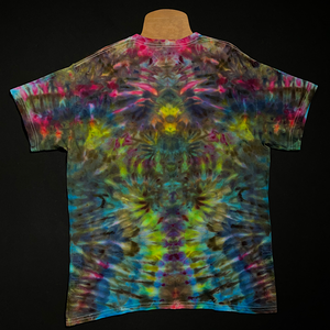 Back side of the same adult large vibrant, tropical rainbow Psychedelic Mindscape ice tie-dyed t-shirt design; laid flat on a solid black background 