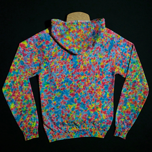 Size small American Apparel tie dye pullover hoodie featuring our exclusive, supreme splatter pattern tie dye design - reminiscent of speckled paint spatter. Boasting intense rainbow colors, including shades of blues, pinks and yellows. Features a Drawstring hood and large kangaroo front pocket.