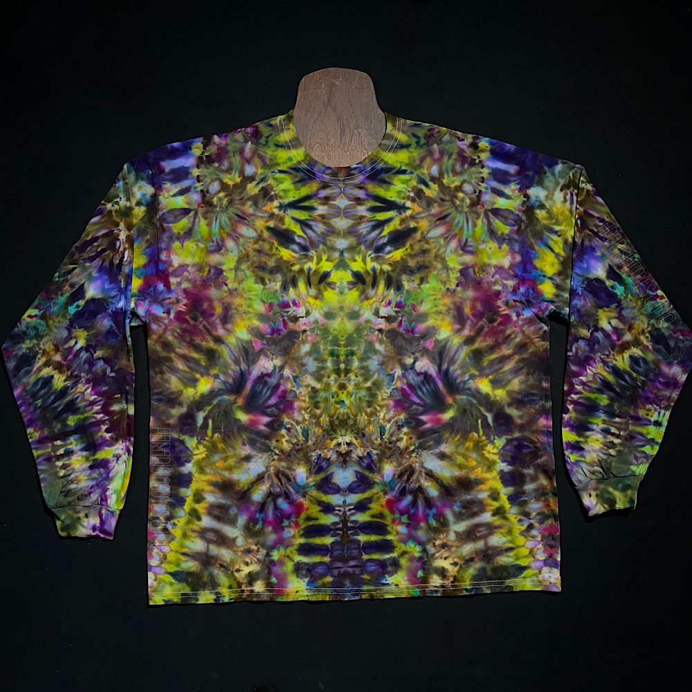 The front side of a second, different Psychedelic Mindscape long sleeve ice dye shirt design featuring the same Halloween themed green & purple color scheme, in an abstract, symmetrical pattern