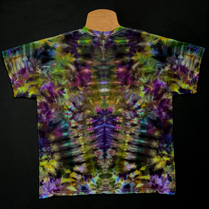 Back side of a Psychedelic Mindscape ice tie dyed shirt design in a Halloween themed green & purple color scheme; featuring an abstract, symmetrical, totem pole reminiscent pattern