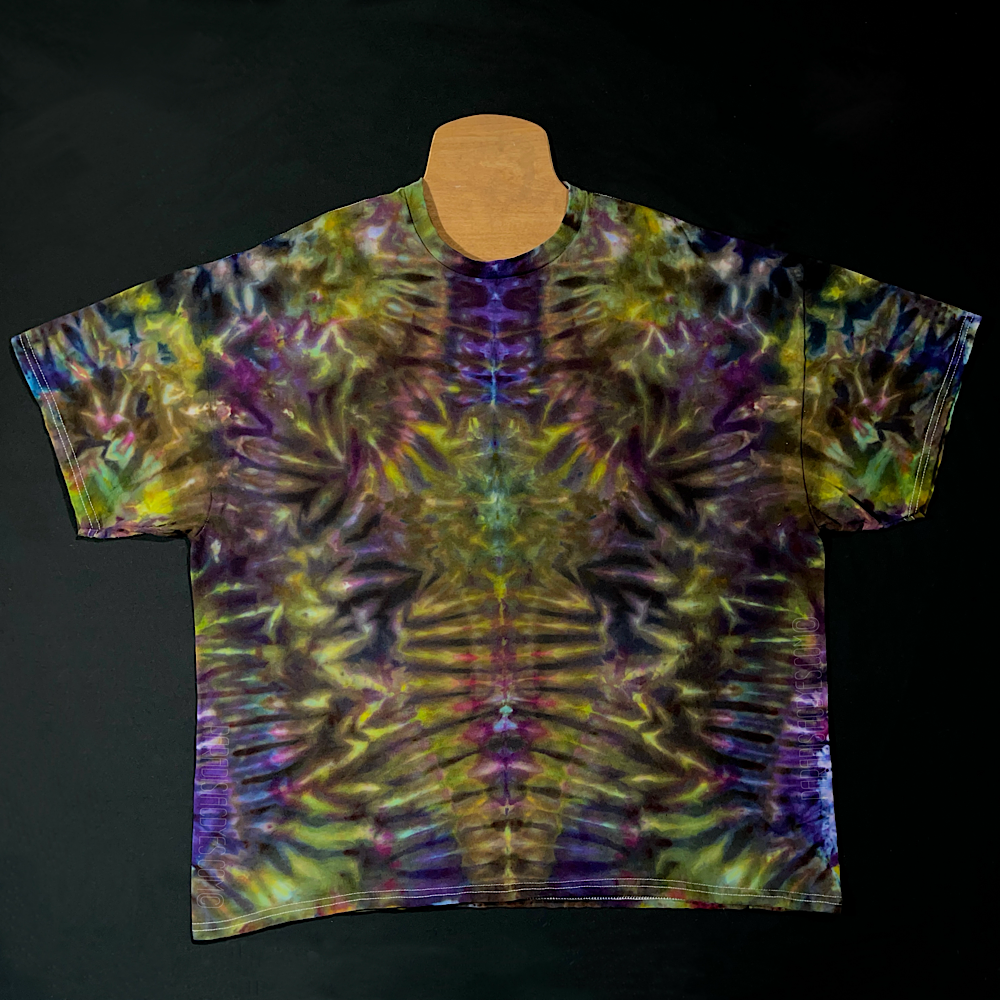 Front side of another custom, handmade-to-order Psychedelic Mindscape ice tie dyed t-shirt design in a Halloween themed green & purple color scheme, featuring an abstract, symmetrical pattern