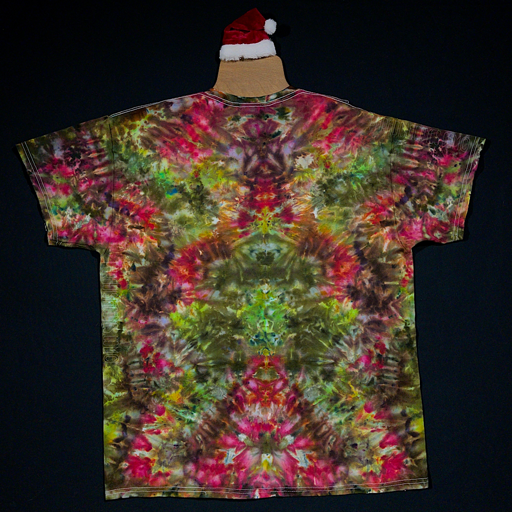 Back side of a Merry Mindscape ice tie dyed t-shirt design, an abstract, symmetrical Christmas inspired wearable art featuring a festive array of red, green & gold shades