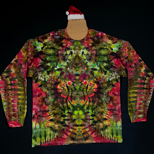 Example of the front side of a Merry Mindscape ice tie dyed long sleeve shirt design; each features a one of a kind abstract, symmetrical pattern in an array of festive red, green & gold shades