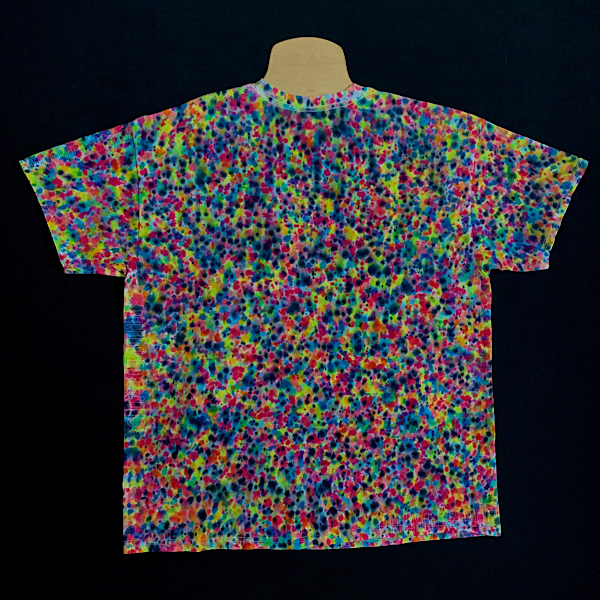 Back side of XL tie dye shirt featuring rainbow paint splatter pattern with dozens of shades of vibrant rainbow colors and a hint of black speckling throughout