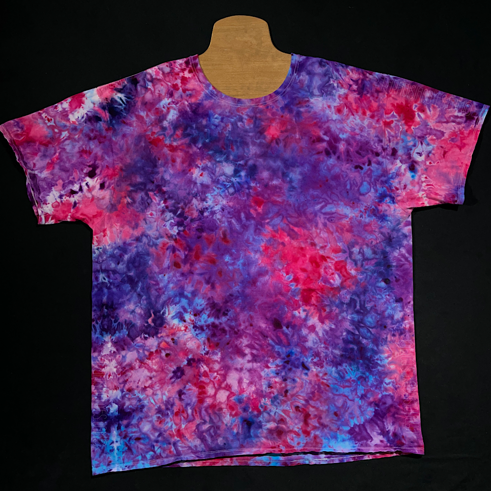 Front side of a made-to-order pink & purple marbled ice dye splatter pattern short sleeve tie dye shirt design