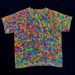 Back side of Youth small tie dye shirt featuring a paint splatter reminiscent pattern with vibrant neon rainbow colors, primarily Shades of: pink, orange, yellow, green and blue