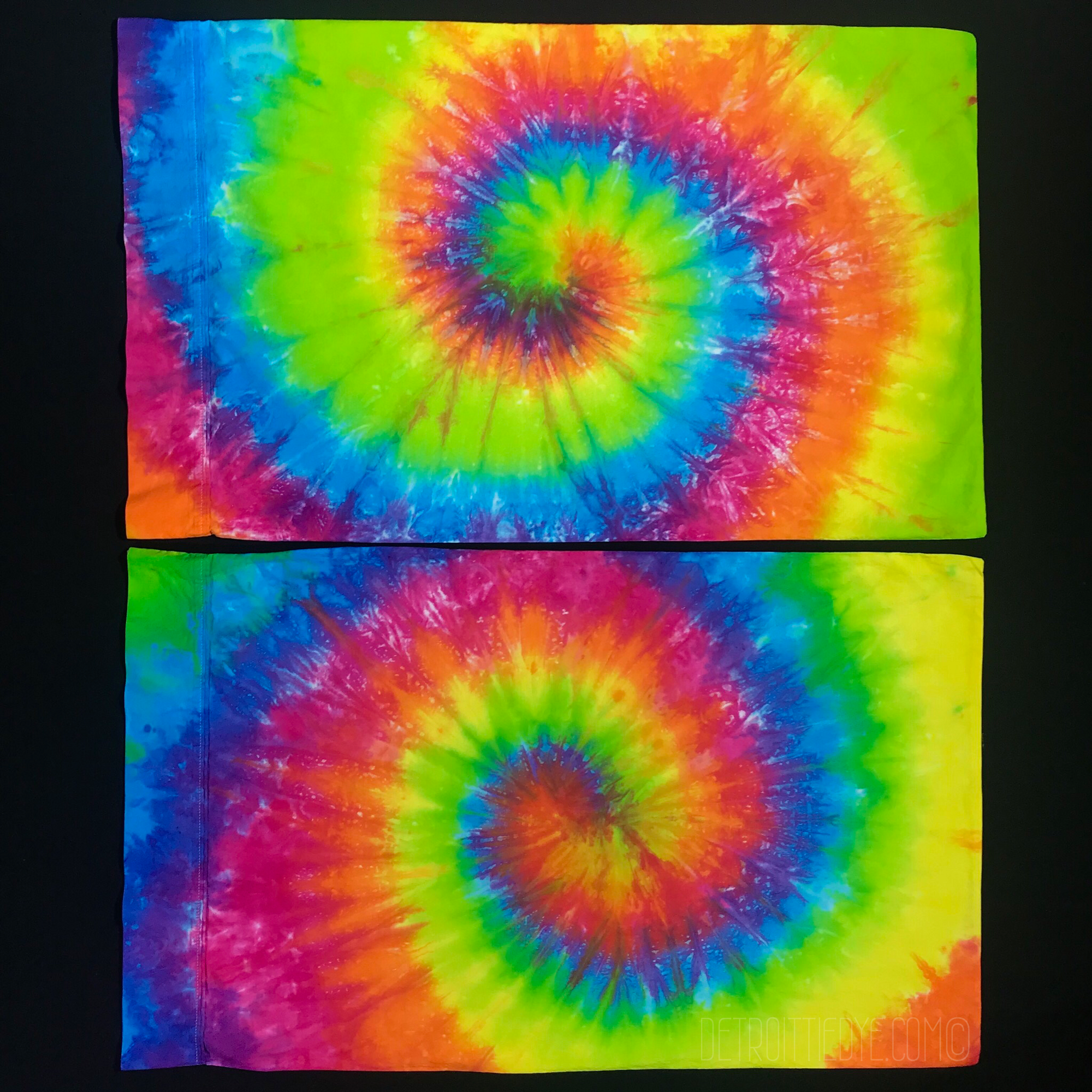 a set of two custom, handmade to order neon rainbow pillowcases featuring: Hot pink, orange, fluorescent yellow, lime green, electric blue tie dye pillowcases