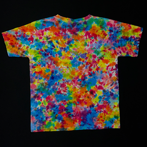 Back side of a hand-dyed, one of a kind size youth small short sleeve, crewneck style tie dye shirt featuring a vibrant blend of pastel, spring-toned rainbow colors in a paint splatter-like pattern