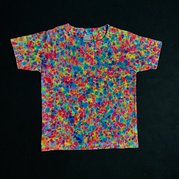 Size 4T toddler tie dye shirt featuring vibrant rainbow colors, including: blue, pink and yellow shades in a speckled paint splatter inspired tie dye pattern. Also similar to the crinkle, crumple or scrunch tie dye design.