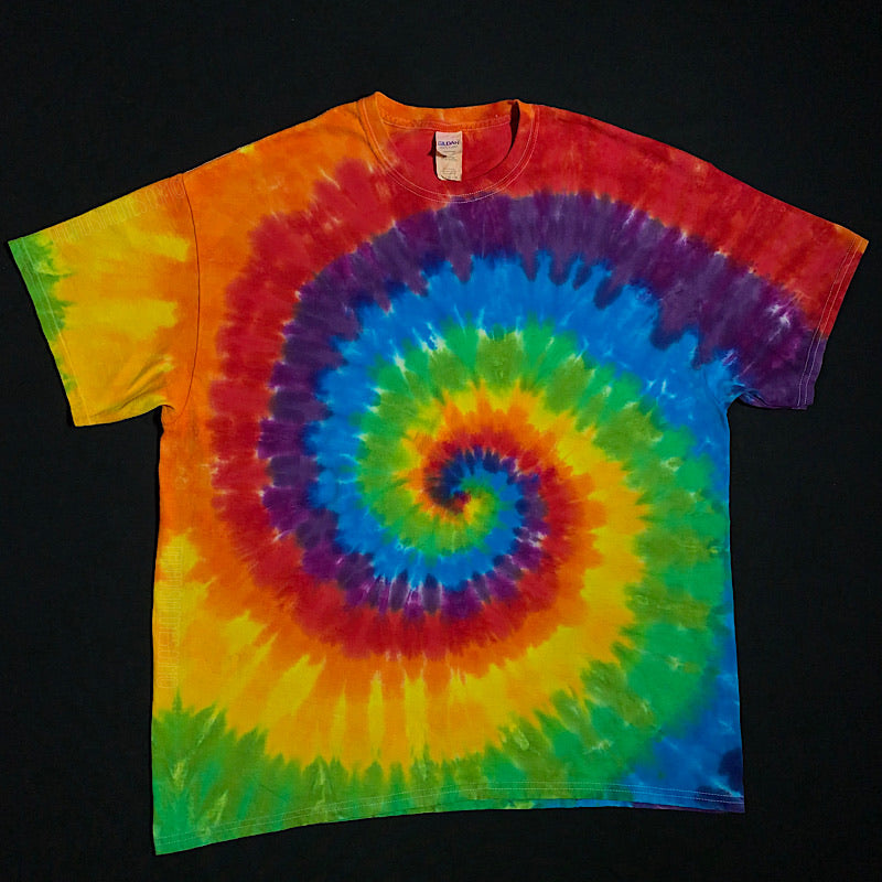 Spiral Tie Dye T-Shirt Featuring LGBTQ+ Gay Pride Flag Colors: Red, Orange, Yellow, Green, Blue & Violet. Custom Handmade to Order in Adult Sizes Small to 3X with 100% Cotton Gildan Tie Dye Shirts. 