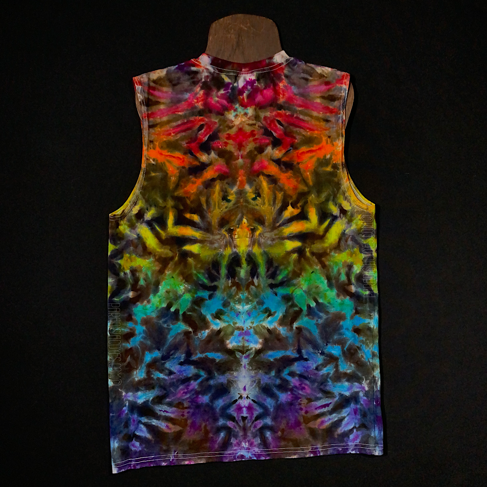 a size medium men's ultra cotton muscle tank featuring an ice dyed symmetrical design with a rainbow gradient color scheme