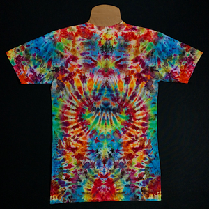 Size small v-neck tie dye t-shirt Featuring rainbow colors, including: red, orange, yellow, green and blue shades in a mesmerizing symmetrical mindscape design