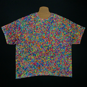 Size Adult 4X Gildan Heavy Cotton Tie Dye Shirt Featuring Vibrant Rainbow Colors in Our Exclusive, Extraordinary Splatter Pattern Tie Dye Design! Loaded with an Unbelievable Amount of Rainbow Colors, Reminiscent of a bowl of the popular Colorful pebble cereal. 