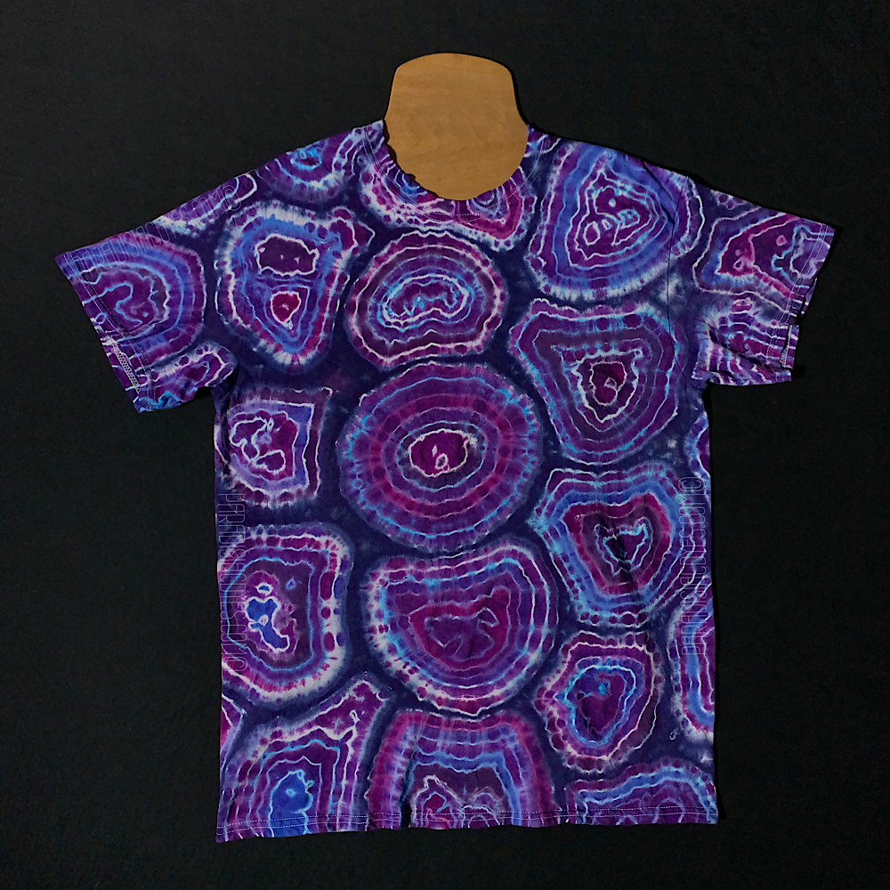 Front side of a short sleeve, crewneck style purple agate geode tie dye shirt design