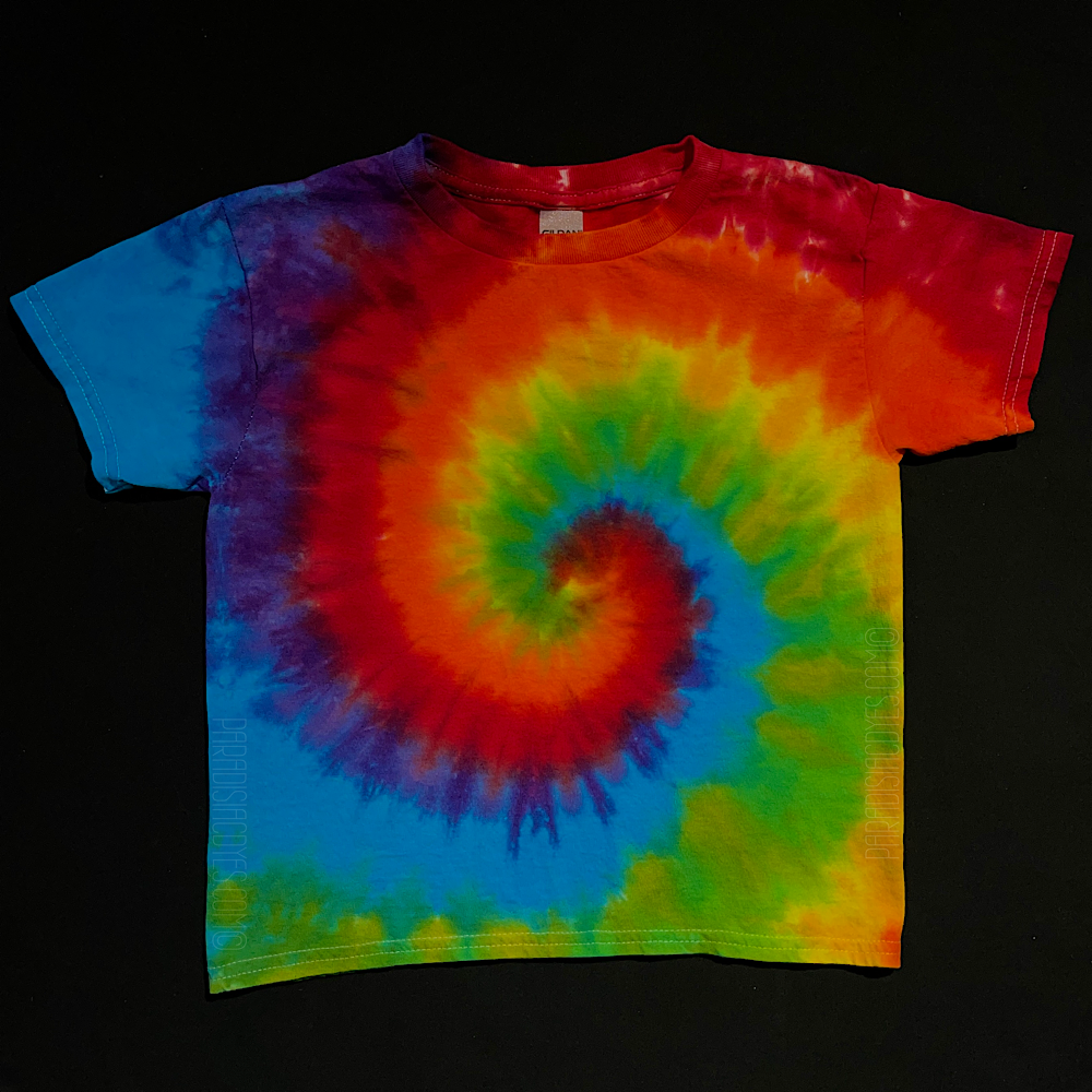 Pride rainbow spiral tie dye short sleeve shirt, laid flat on a solid black background.