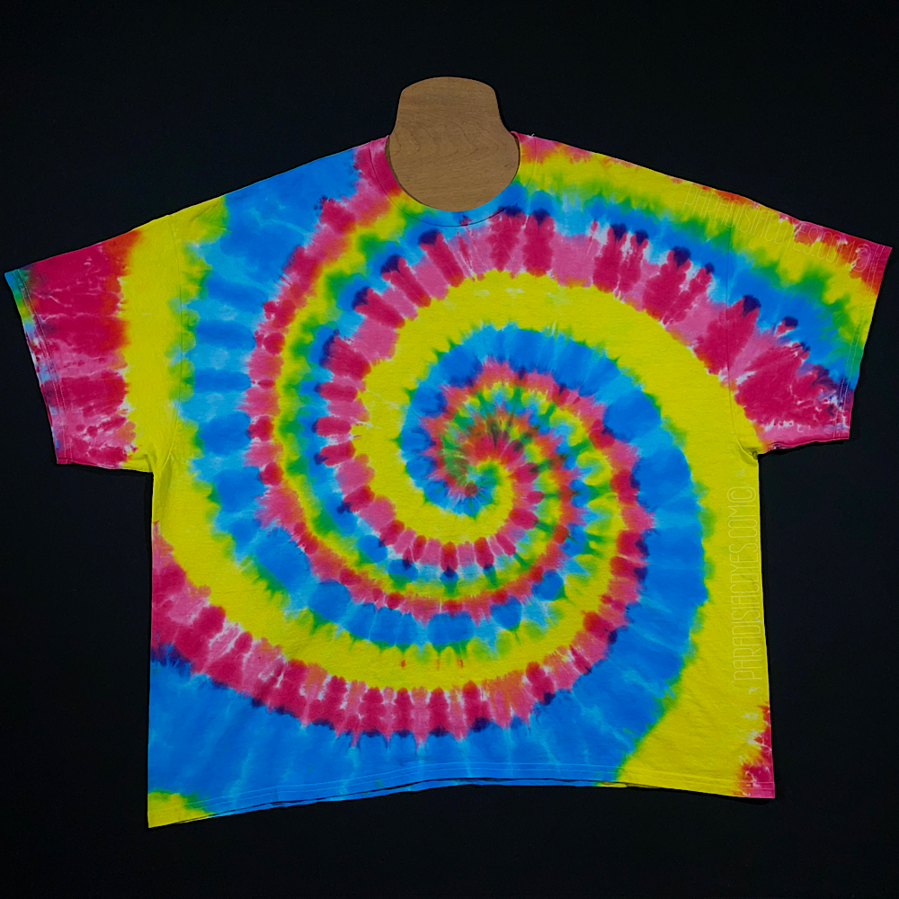 Another example of a custom handmade to order neon rainbow spiral tie dye shirt design, depicting the extent of how much each hand-dyed, one of a kind tee may vary