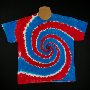 Another example of the extent of variation that may occur between each handmade, one of a kind red, white & blue spiral tie dye t-shirt design