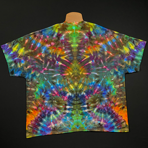 Back side of the same size 4XL psychedelic mindscape rainbow ice dyed t-shirt, featuring a trippy totem pole reminiscent design in primarily shades of blue, minty greens, orange, purple & yellow